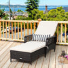 Adjustable PE rattan chaise lounge chair with thick cushion and lumbar pillow, perfect for outdoor relaxation by the.