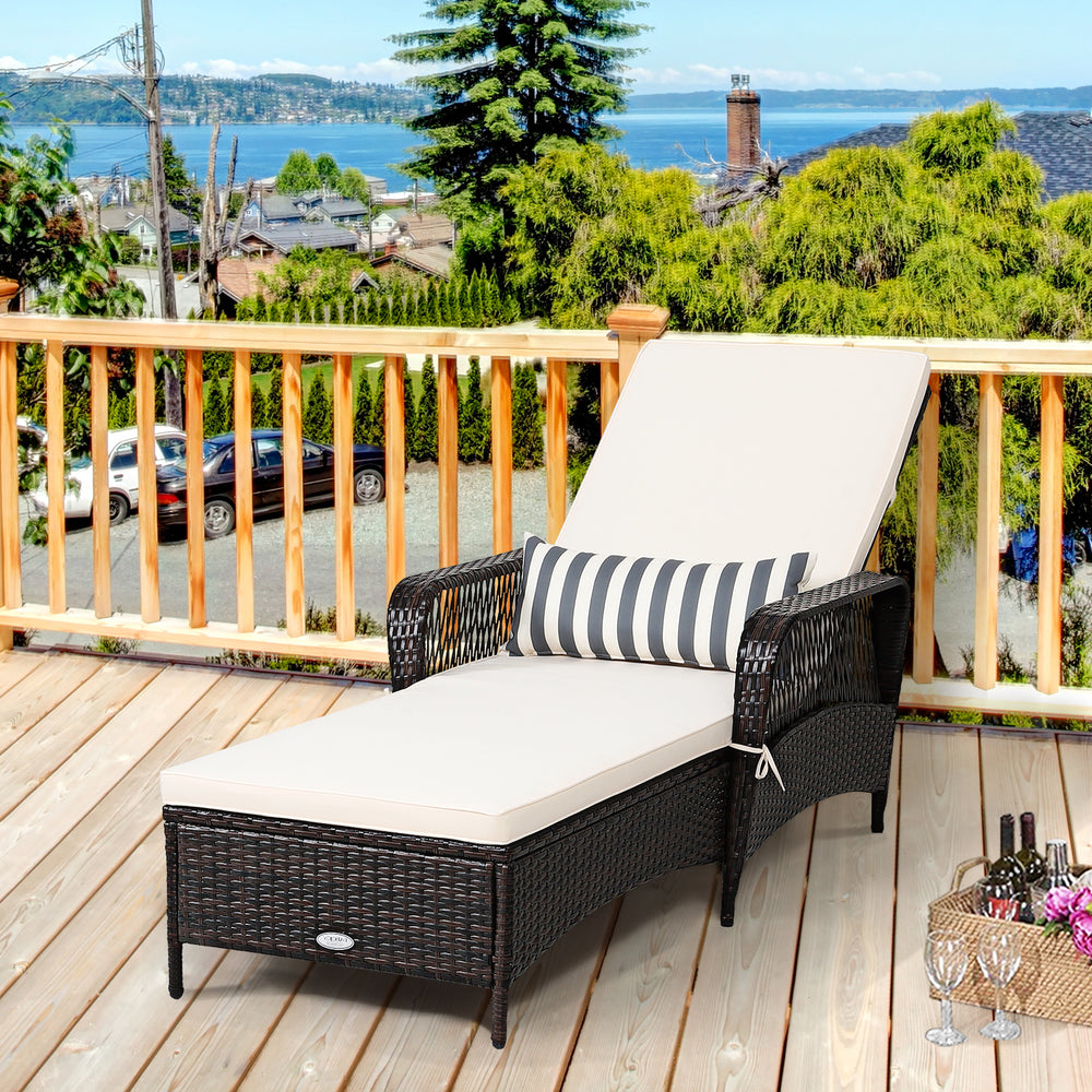 Adjustable PE rattan chaise lounge chair with thick cushion and lumbar pillow, perfect for outdoor relaxation by the.
