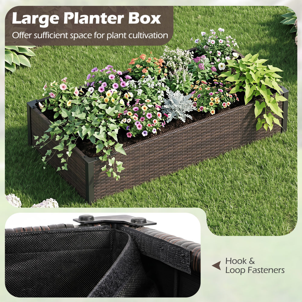Large raised garden bed made of durable PE rattan with removable liner, ideal for planting flowers and herbs outdoors.