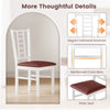 White dining chair with PU leather seat, high backrest, and reinforced crossbars for stability in modern dining spaces.
