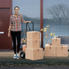 P-handle hand truck with foldable load plate, featuring heavy-duty metal construction and double bearing wheels for.