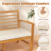 Patio 64-inch wood bench with off-white elastic seat cushion and slatted design, perfect for backyard comfort.
