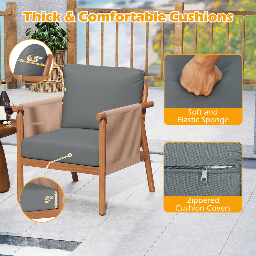 Gray patio chair with thick cushions, acacia wood frame, and woven rope armrests for comfortable backyard seating.