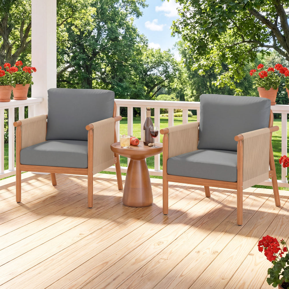 Patio acacia wood chairs with gray cushions and woven rope armrests, perfect for backyard relaxation on a sunny day.