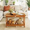 Rectangular 2-tier acacia wood coffee table with a natural finish, ideal for indoor or outdoor use, showcasing storage.
