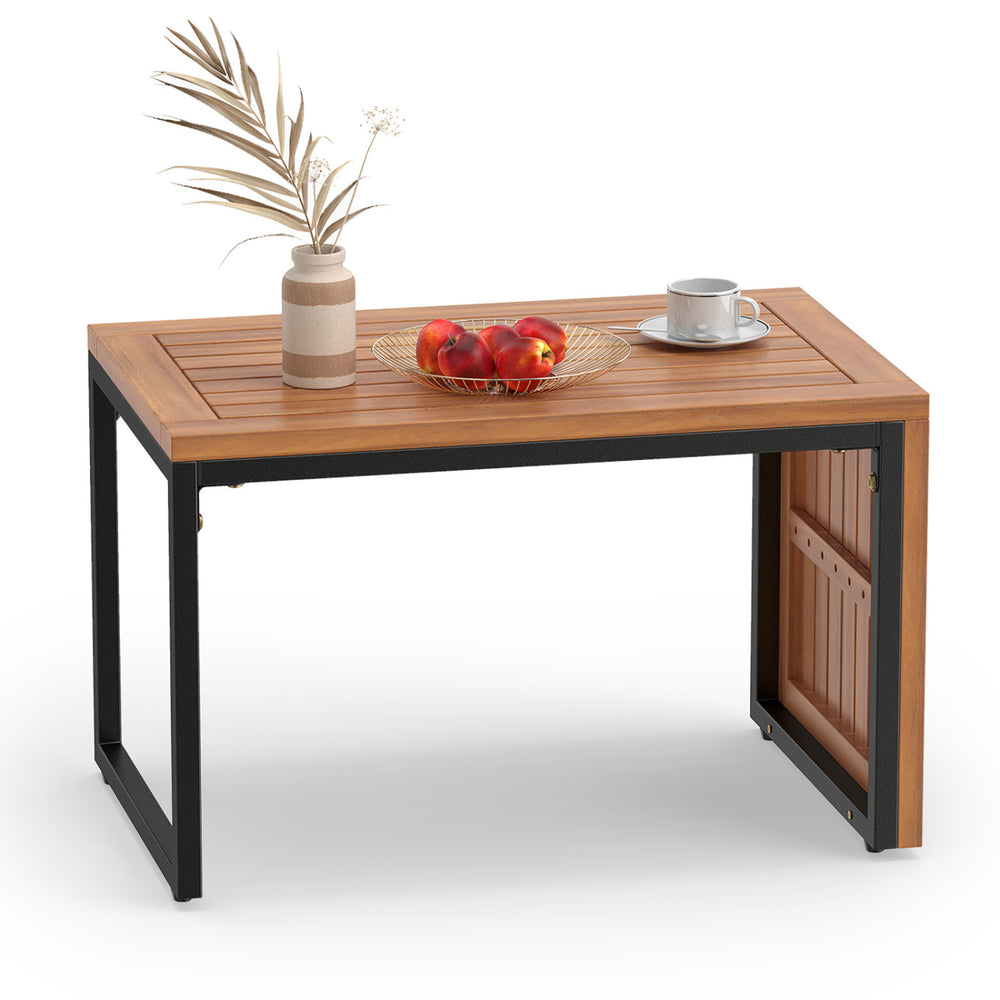 Acacia wood side table with slatted surface and heavy-duty metal frame, perfect for outdoor patio or garden use.