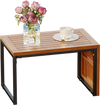 Acacia wood side table with slatted surface, ideal for outdoor use by the poolside, offering a stylish and functional design.
