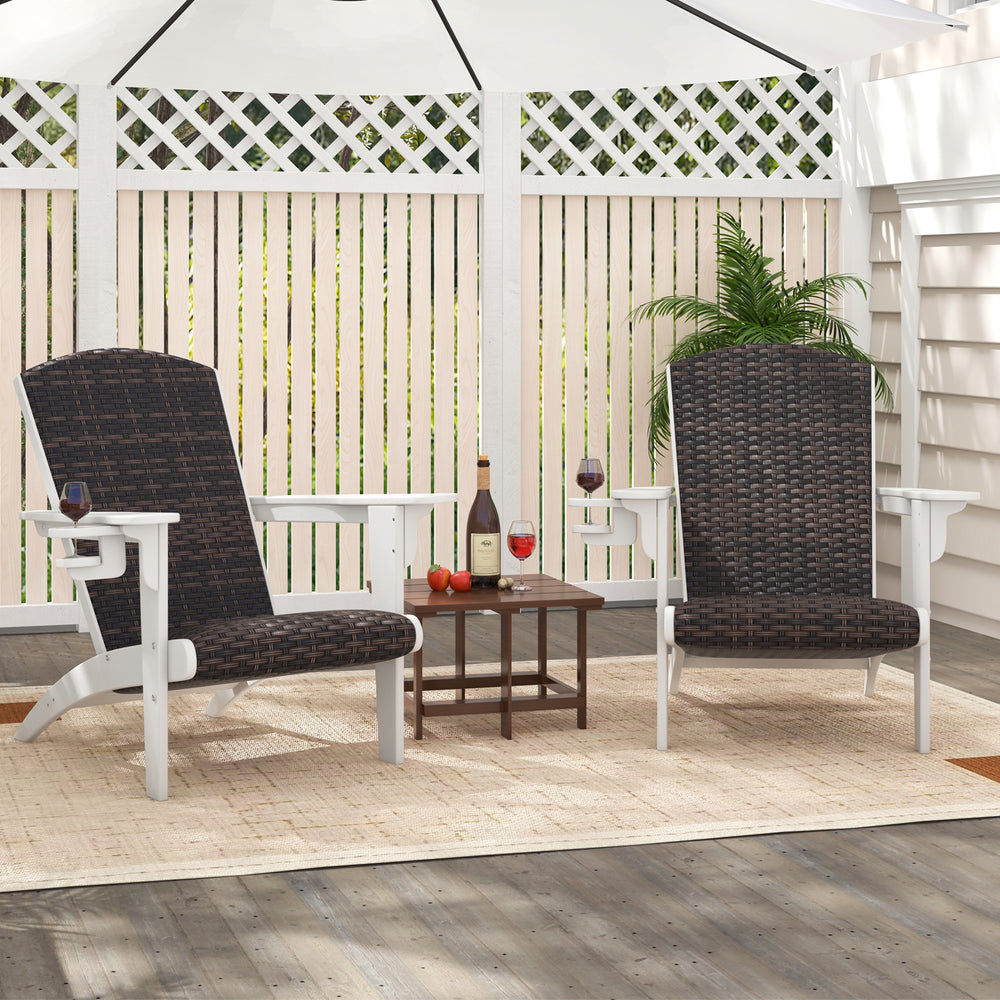 Two white patio Adirondack chairs with rattan padded seats and hidden cupholders, perfect for outdoor relaxation.