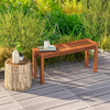 Backless 2-seater patio dining bench made of solid wood with a slatted seat, ideal for outdoor garden use.