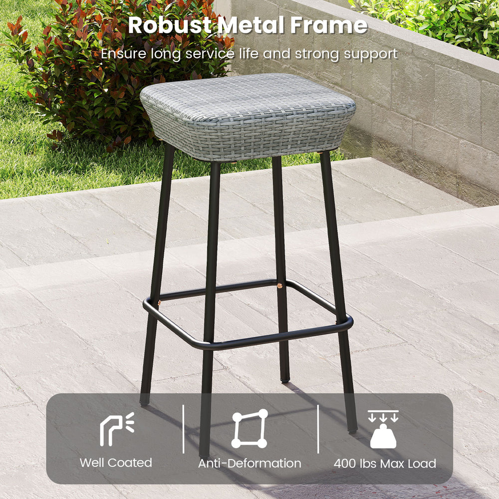 Patio bar stool with rattan seat and sturdy metal frame, supporting up to 400 lbs, ideal for outdoor use.
