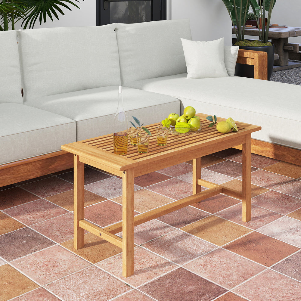 Rectangular 36-inch patio coffee table made of teak wood, featuring a slatted tabletop, ideal for outdoor use.