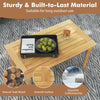 Patio coffee table with solid teak wood structure, slatted tabletop, and smooth surface for indoor and outdoor use.