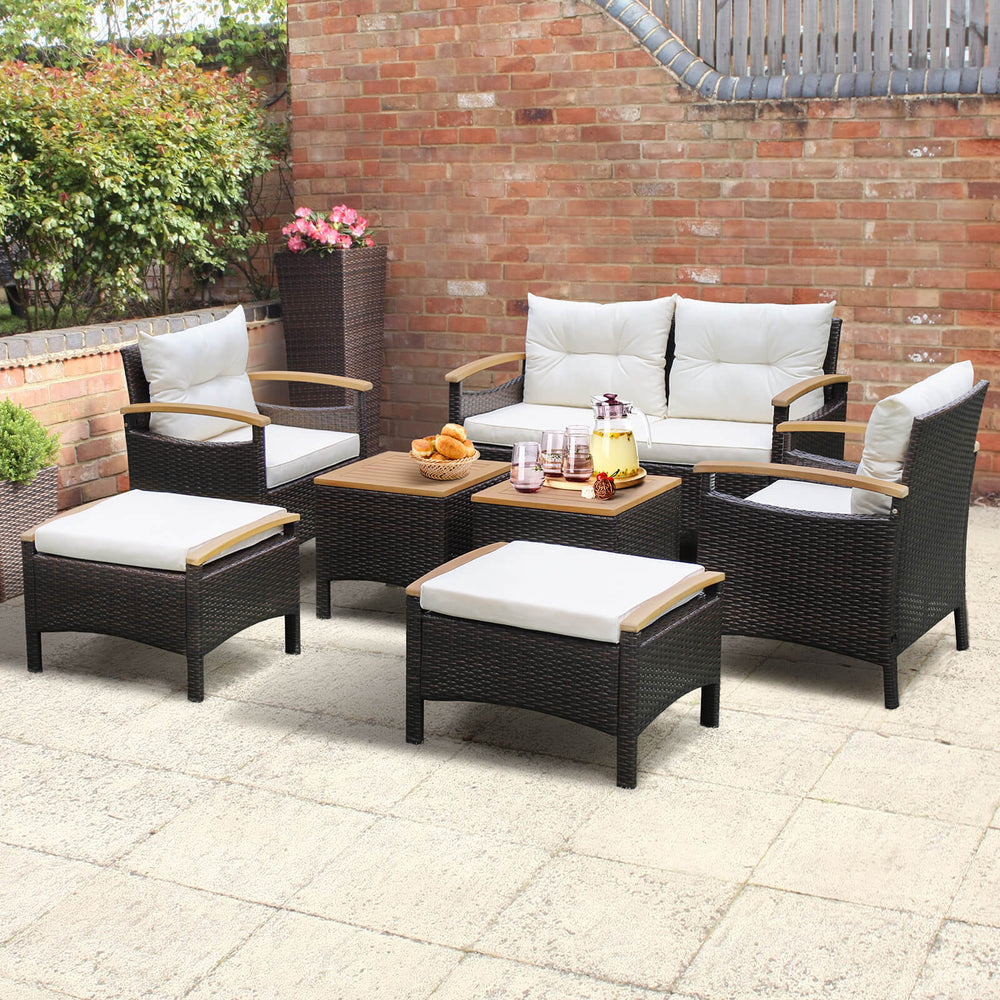 7-piece rattan patio sofa set featuring acacia wood tabletop and cushions, perfect for outdoor relaxation in any space.
