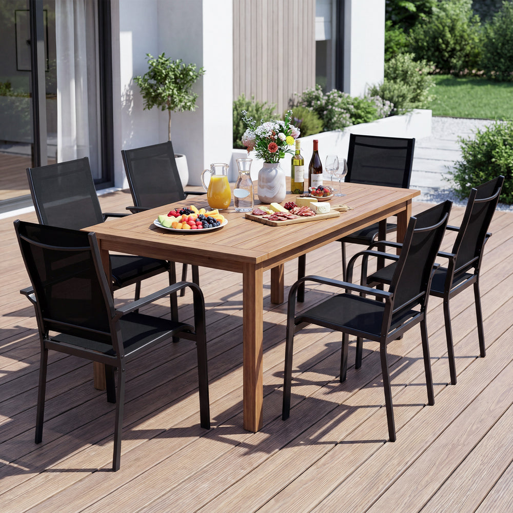 Stackable outdoor armchairs with metal frame, breathable mesh fabric, ideal for patio dining and gatherings.