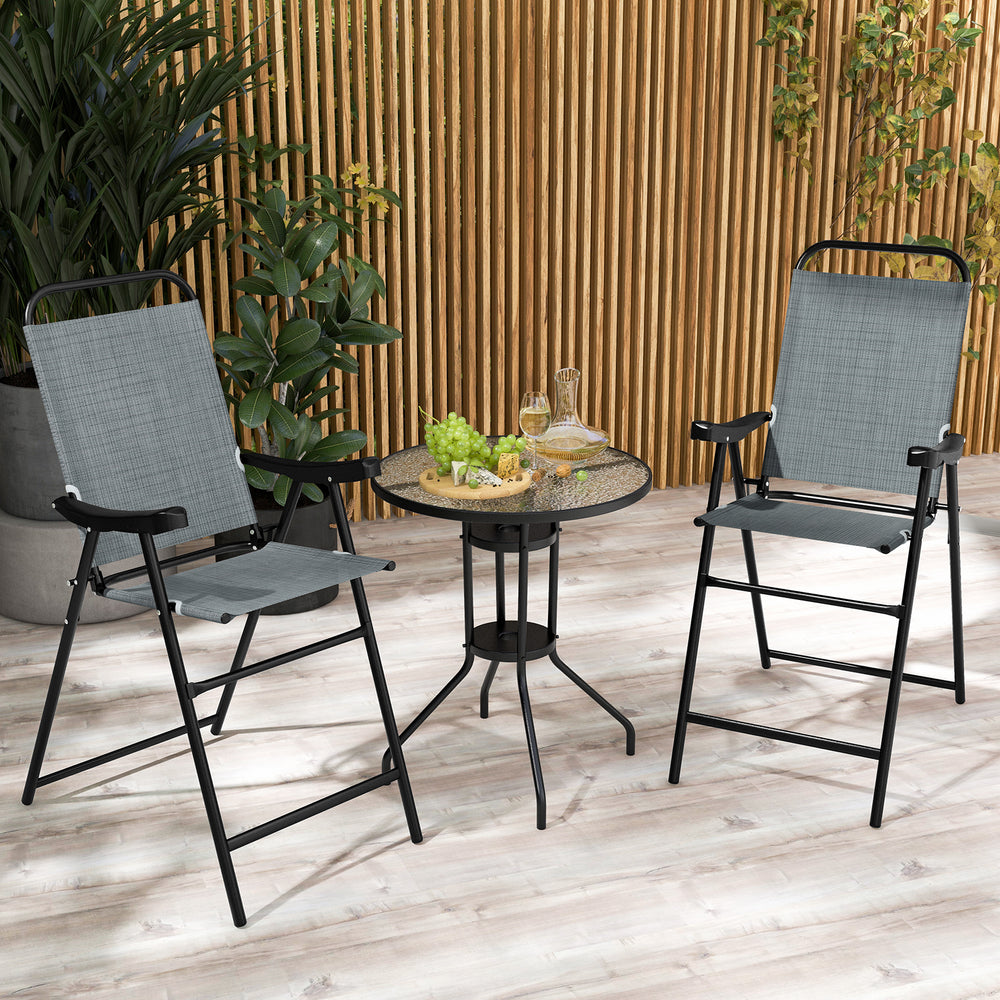 Two blue patio folding bar stools with metal frames and footrests, ideal for outdoor relaxation on the balcony or.