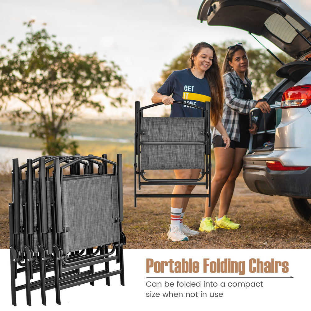 Set of 4 gray patio folding chairs with cozy fabric and heavy-duty metal frame, ideal for backyard relaxation.
