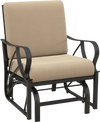 Patio glider rocking chair with tan thick cushion, curved armrests, and durable metal frame for outdoor relaxation.