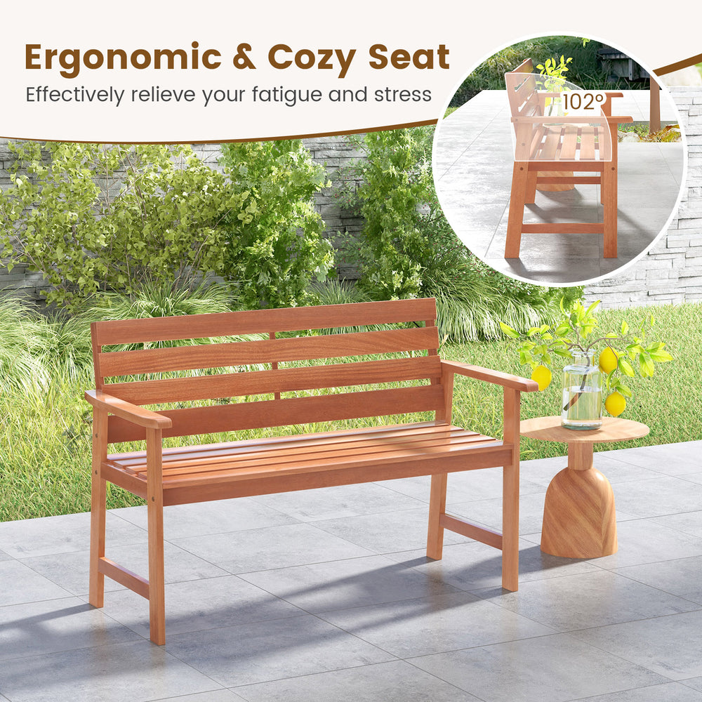 Solid wood patio bench with slatted seat and inclined backrest, perfect for outdoor relaxation in backyard or porch.