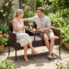 Patio loveseat wicker 2-seat conversation set in brown with ergonomic back and integrated coffee table for outdoor relaxation.