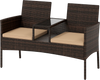 Curved brown patio loveseat made of handwoven PE rattan with cushions and built-in coffee table for outdoor relaxation.