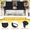 Patio loveseat with built-in table, breathable black fabric, sturdy metal frame, ideal for garden or poolside.