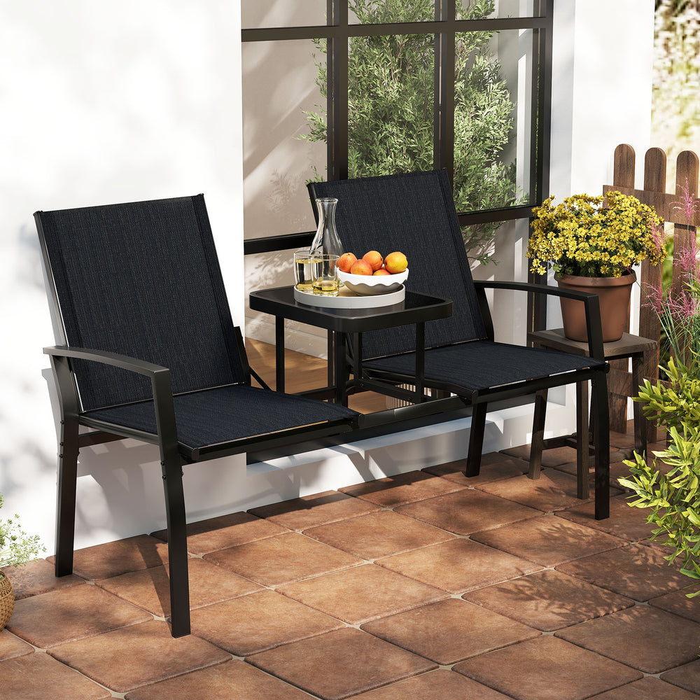 Patio loveseat with built-in table, breathable black fabric, and durable metal frame, perfect for garden or porch use.