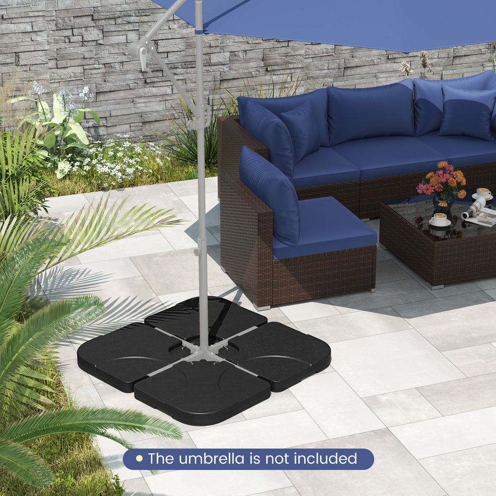 Sturdy 20-inch sand-black patio umbrella base with four plates, designed for stability in windy conditions.