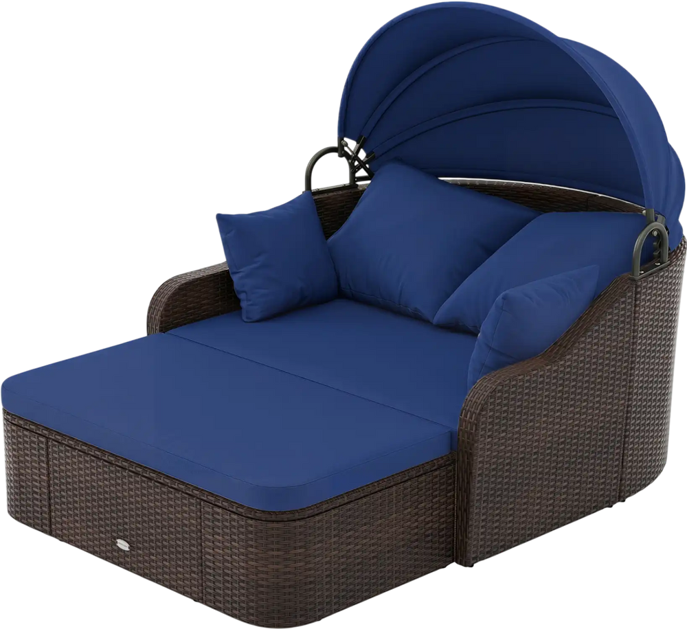 Patio PE rattan daybed with retractable canopy and navy cushions, perfect for lounging in the garden or by the poolside.