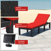 Cushioned height adjustable lounge chair in red and off-white, made of weather-resistant rattan for patio relaxation.