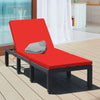 Red cushioned height adjustable lounge chair made of PE rattan and steel, perfect for patio or poolside relaxation.