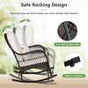 Patio rattan rocking chair with white cushions, featuring a stable base and ergonomic design for outdoor relaxation.