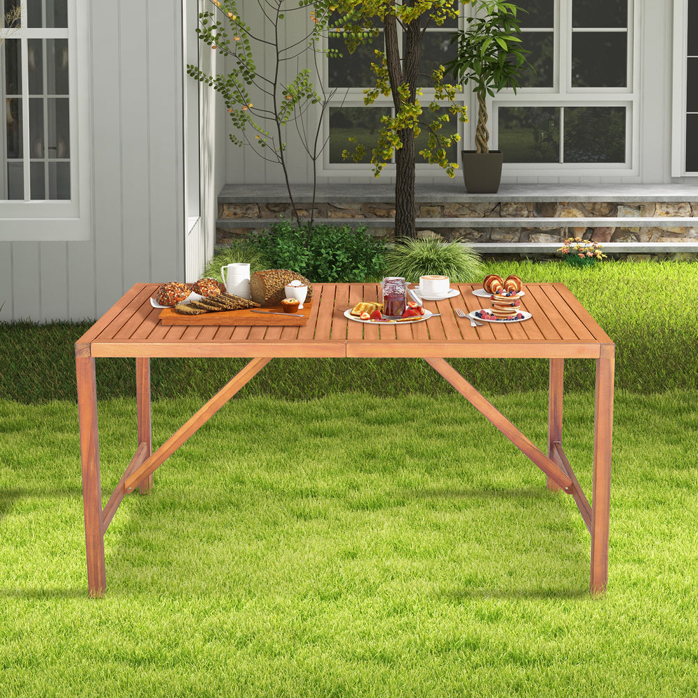 Rectangular 55-inch acacia wood dining table with slatted top and umbrella hole, perfect for outdoor gatherings.