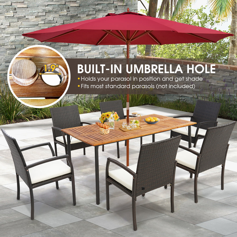 Acacia wood dining table with built-in umbrella hole, seating 6, featuring sturdy metal legs for outdoor dining.