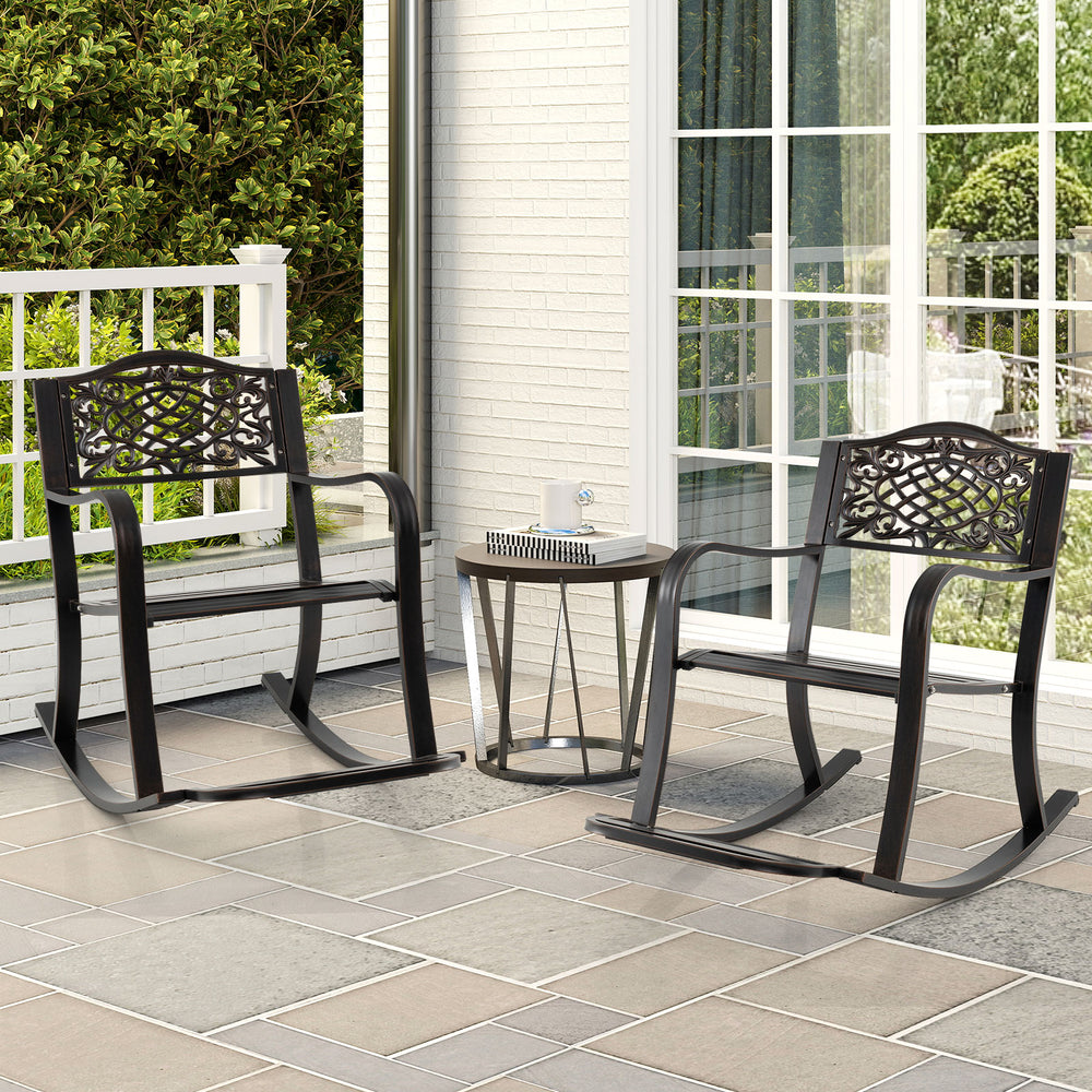 Brown patio rocking chairs with footrest and floral backrest, perfect for backyard relaxation and outdoor seating.