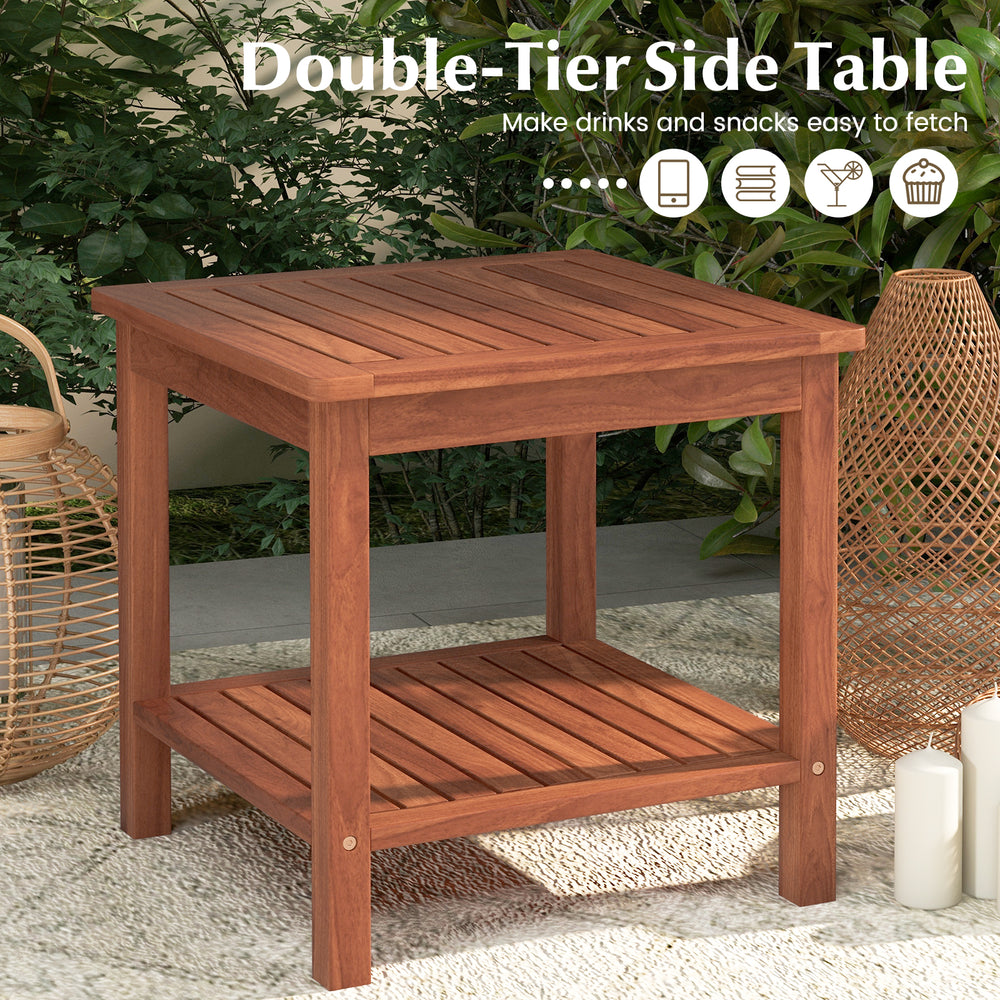 Double-tier acacia wood patio side table with slatted top and shelf, perfect for drinks and snacks by the poolside.