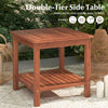 Double-tier acacia wood side table with slatted top and shelf, perfect for drinks and snacks in outdoor settings.