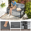 Patio storage bench loveseat in gray wicker with removable cover, ideal for backyard and poolside seating.