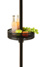 Adjustable black patio umbrella table tray with snacks and drinks, perfect for outdoor gatherings by the pool.