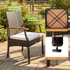 Patio wicker chair with ergonomic backrest, curved armrests, and soft zippered cushion for backyard relaxation.