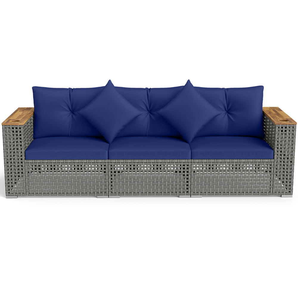 Navy blue patio wicker sectional sofa with acacia wood armrests and removable cushions for outdoor comfort.