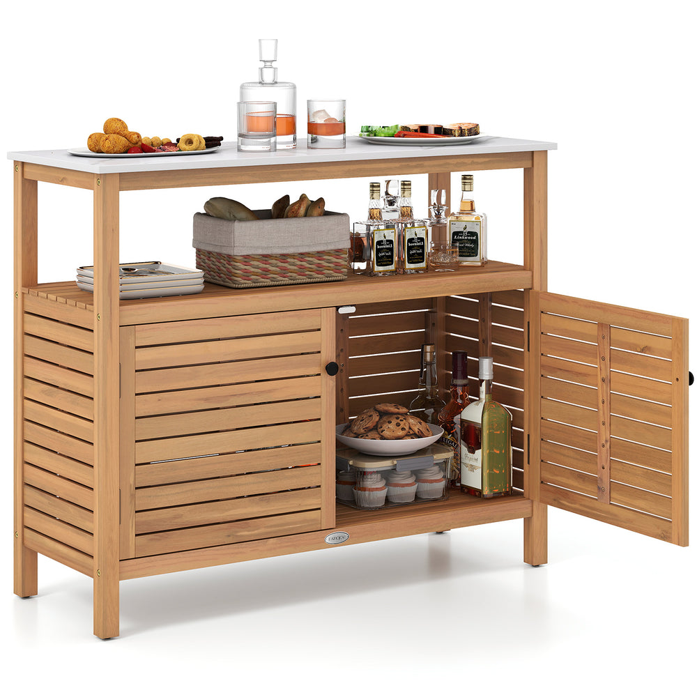 Acacia wood patio storage cabinet with marble-like countertop, featuring two doors for versatile outdoor organization.