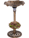 Standing pedestal birdbath with lotus leaf bowl in bronze, featuring a solar lamp and planter for outdoor charm.