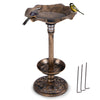 Standing pedestal birdbath and feeder combo in bronze with lotus leaf bowl, ideal for outdoor bird bathing and feeding.