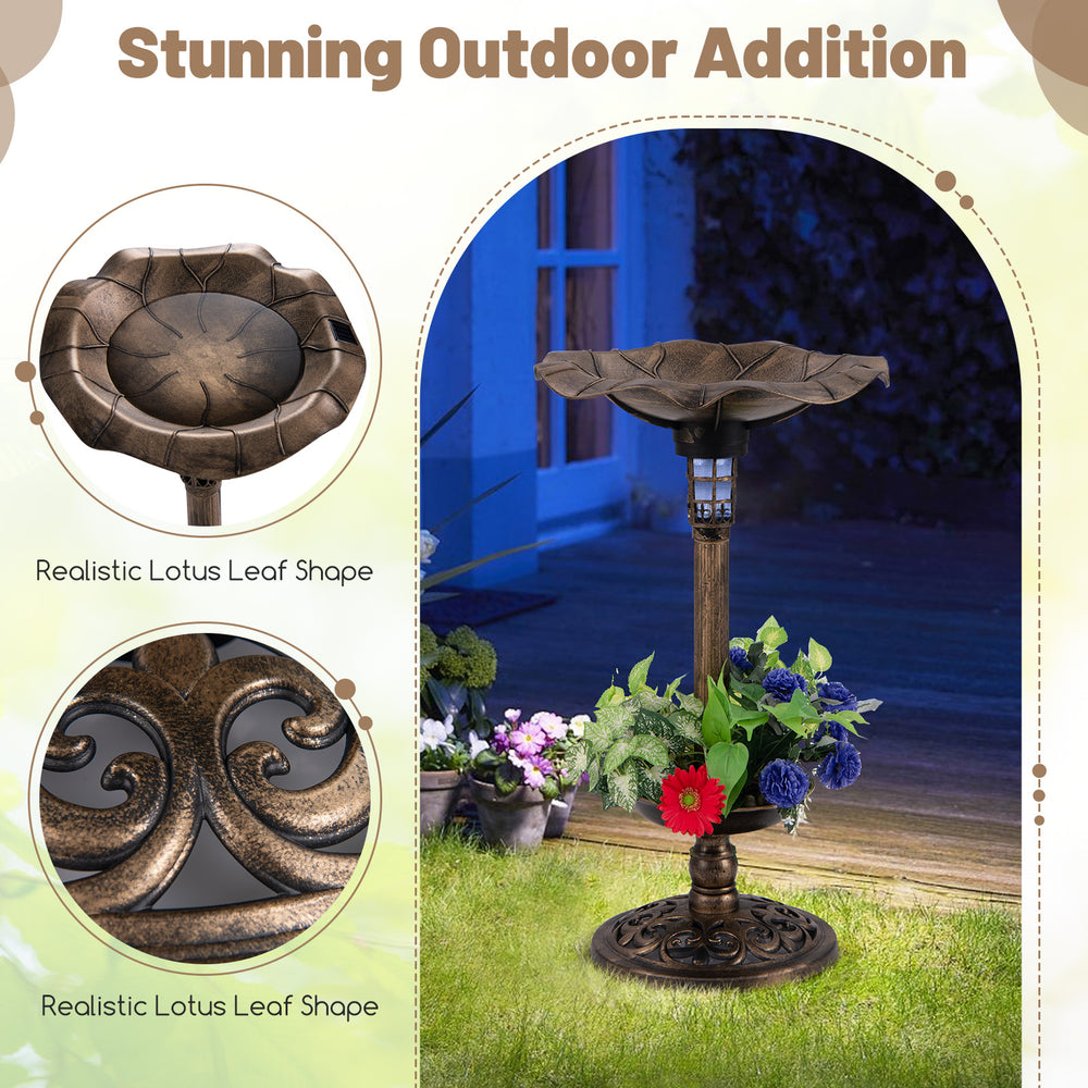 Standing pedestal birdbath with a lotus leaf bowl in bronze, featuring a solar lamp and planter for outdoor charm.