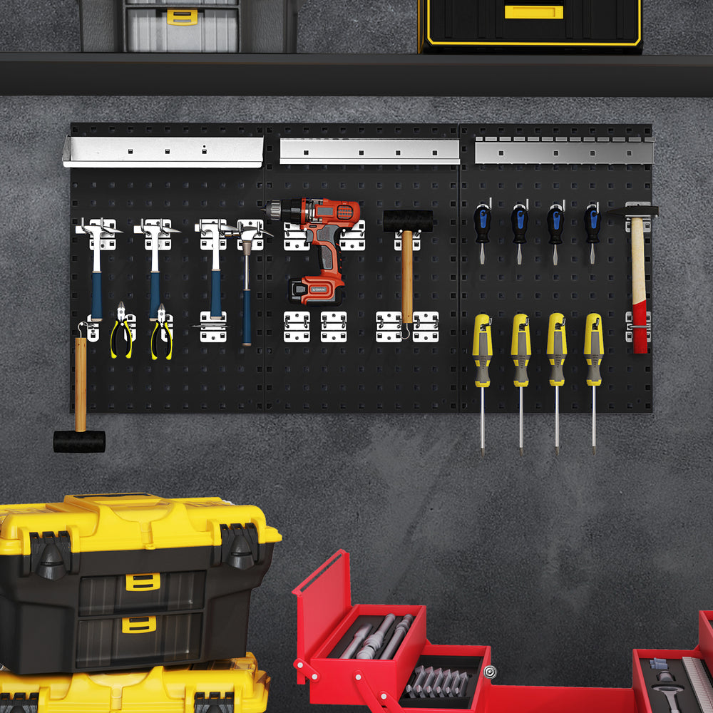 Wall-mounted pegboard kit with tools organized, featuring 3 metal pegboards and assorted hanging accessories for garage.