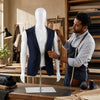 Male mannequin with adjustable head and arms, made of durable PP material, ideal for displaying suits and shirts.