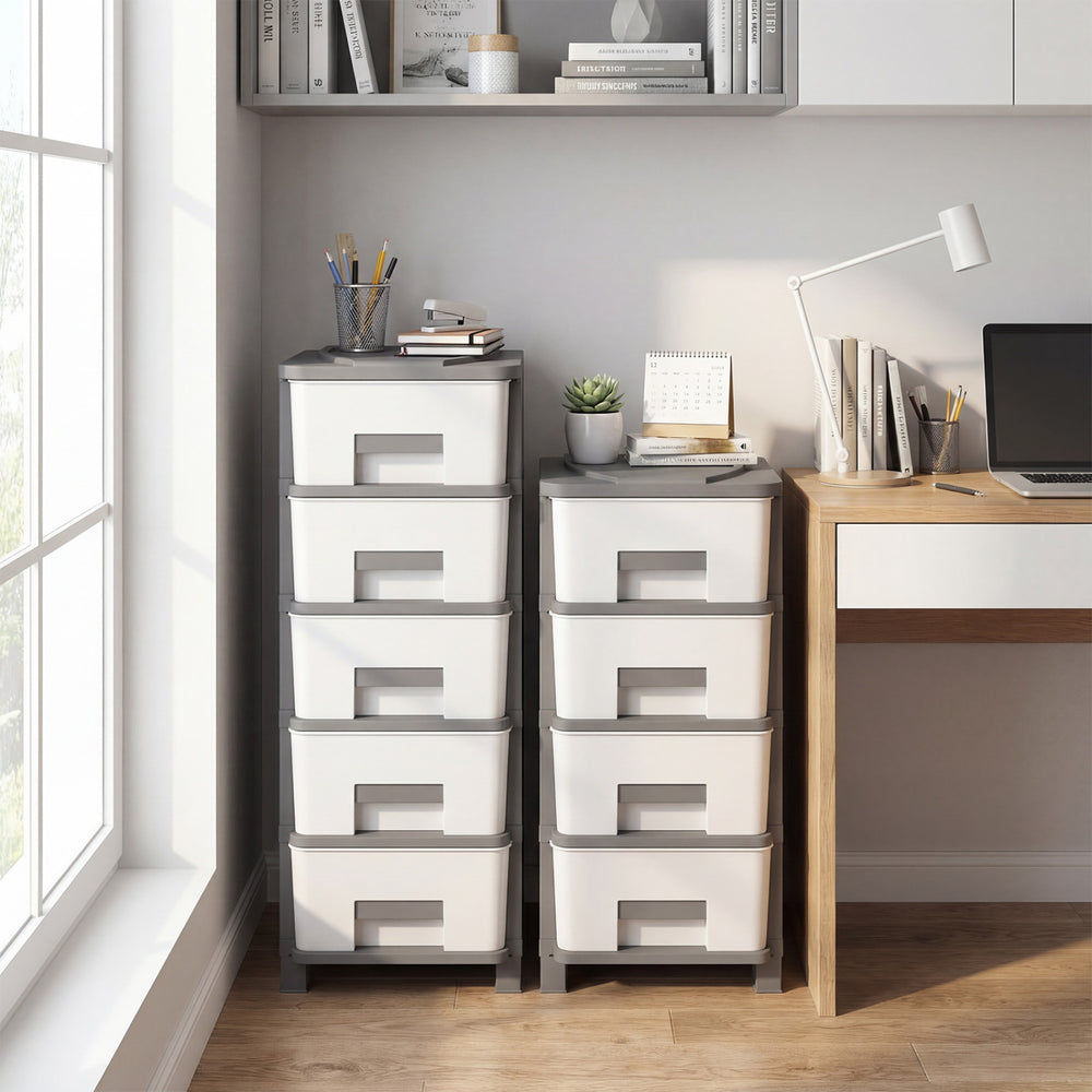 Compact gray plastic storage organizer with drawers and spacious tabletop, perfect for small bedroom spaces.
