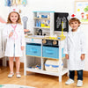Wooden medical center toy set with blackboard, featuring a sink, storage shelves, and two child doctors for imaginative.