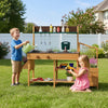 Wooden play kitchen for kids with removable sink, stoves, and planter boxes, ideal for outdoor imaginative play.