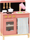 Wooden play kitchen set in pink with stove, sink, and oven, designed for kids aged 3+, encourages imaginative play.